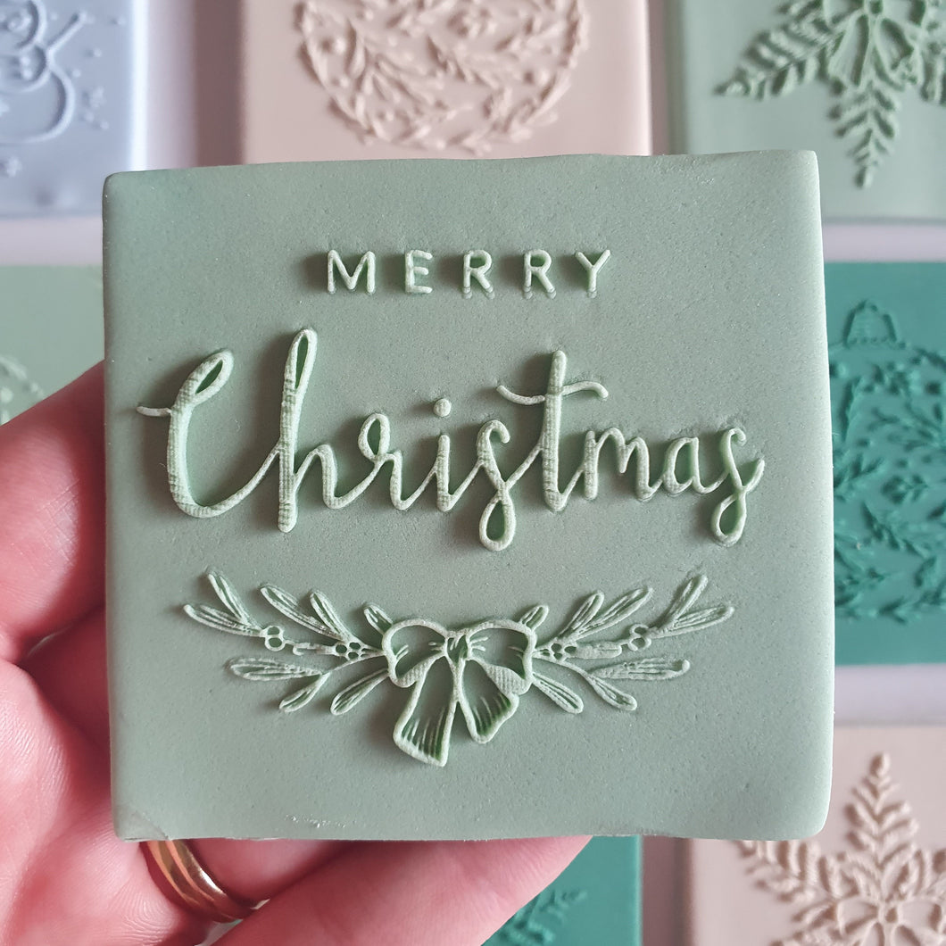 Merry Christmas Bow Raised Stamp